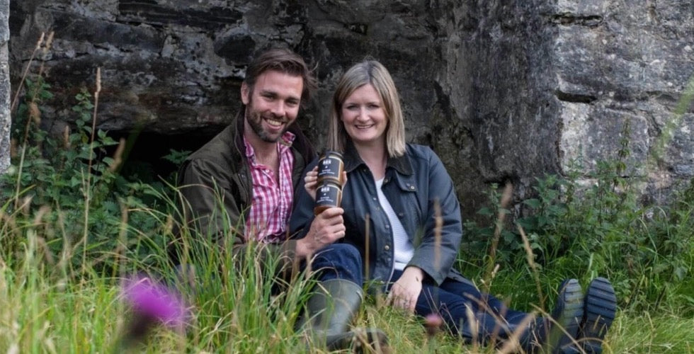 co-founders, suzie and Iain, in the heather hills