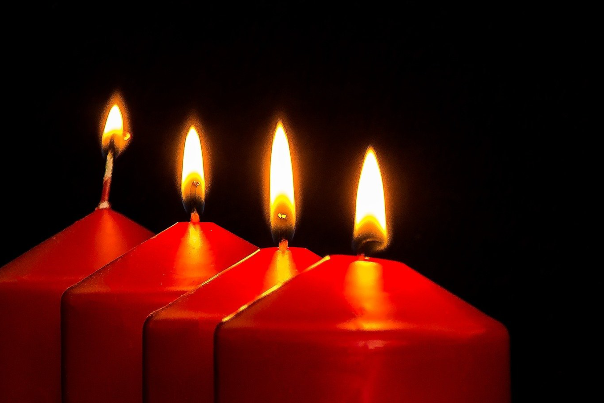 four candles burning