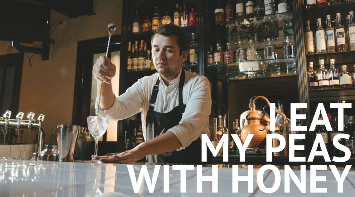 Man making cocktail with text 'I eat my peas with honey'