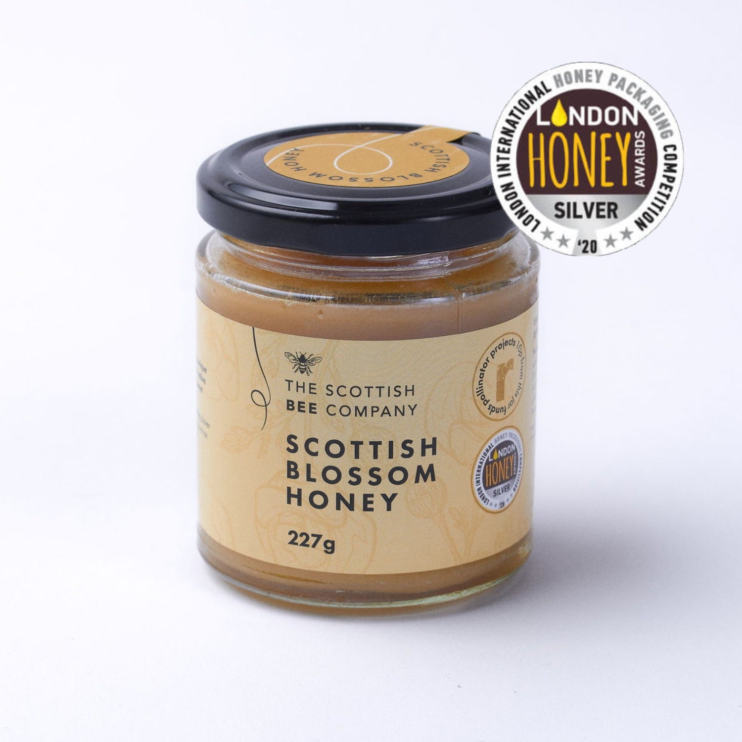 Jar of Scottish Blossom Honey from The Scottish Bee Company with a London Honey Award badge on a white background