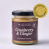 Jar of Cranberry & Ginger Blossom Honey from The Scottish Bee Company on a light gray background