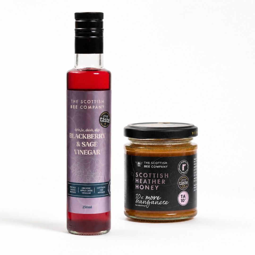 scottish bee company heather honey and blackbery &amp; sage vinegar on a plain white background 