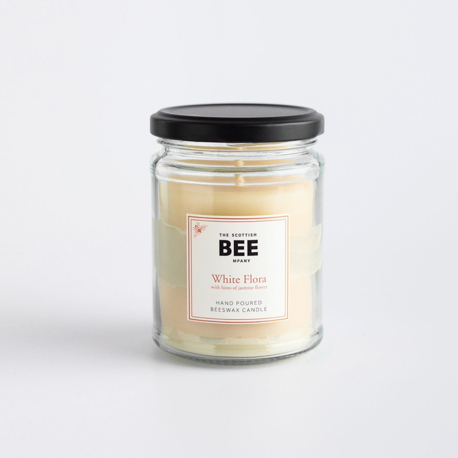 White Flora with hints of jasmine flower scented beeswax candle