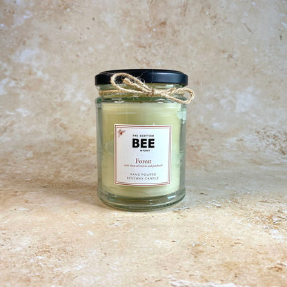 Forest with hints of vetiver and patchouli scented beeswax candle